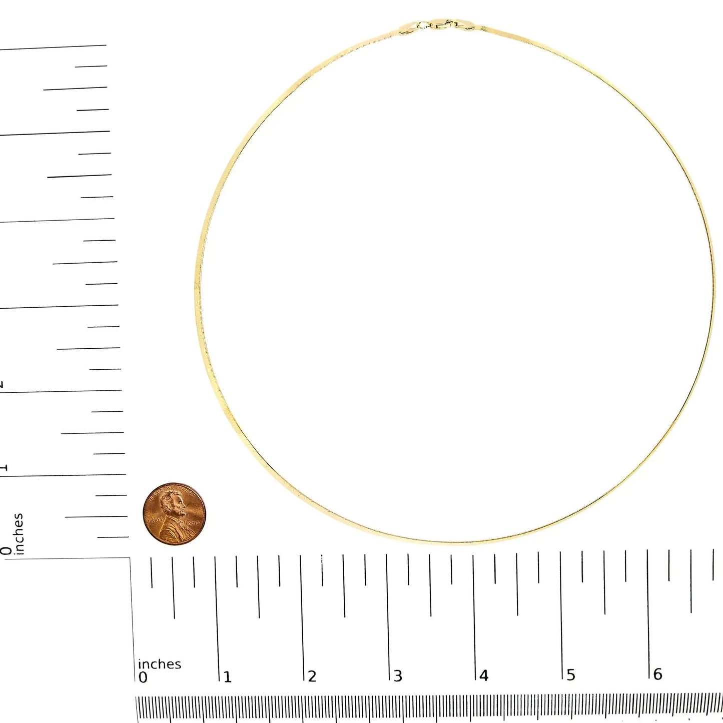 14k gold herringbone chain necklace displayed flat with ruler and penny for size reference