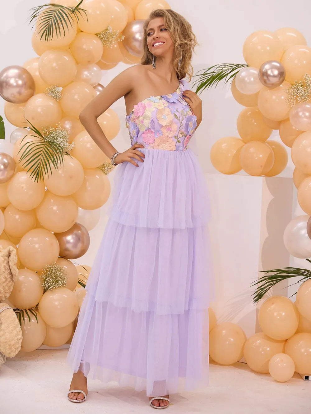 Lifestyle shot of trendy embroidered summer dress and long skirt in summer fashion