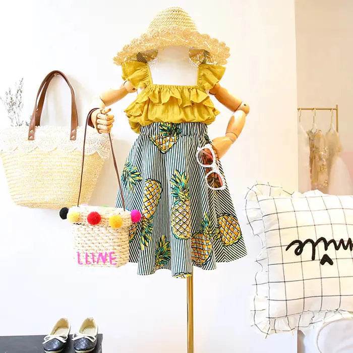 Solstik girls pineapple skirt and top set with yellow ruffled top and pineapple print skirt