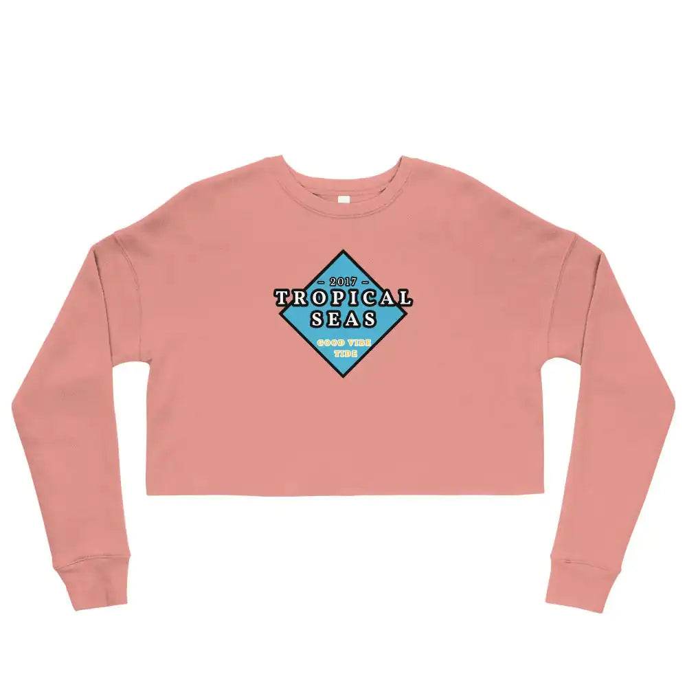 Pink cropped sweatshirt with tropical seas graphic in blue and black tropical breeze sweatshirt for women