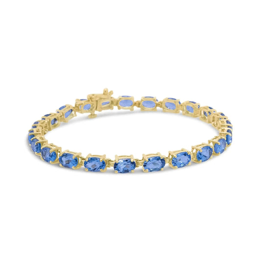 10K Yellow Gold Oval Blue Topaz Tennis Bracelet - 7 Inch - Solstik