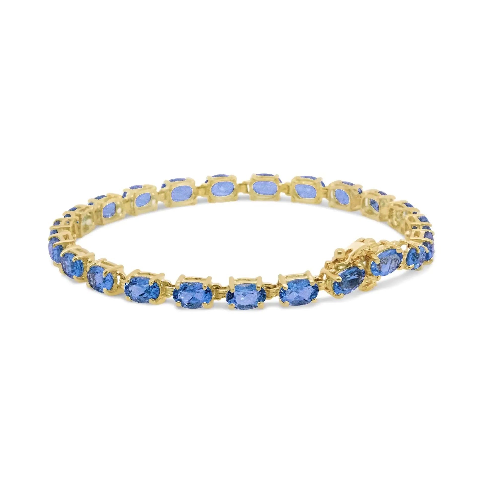 10K Yellow Gold Oval Blue Topaz Tennis Bracelet - 7 Inch - Solstik