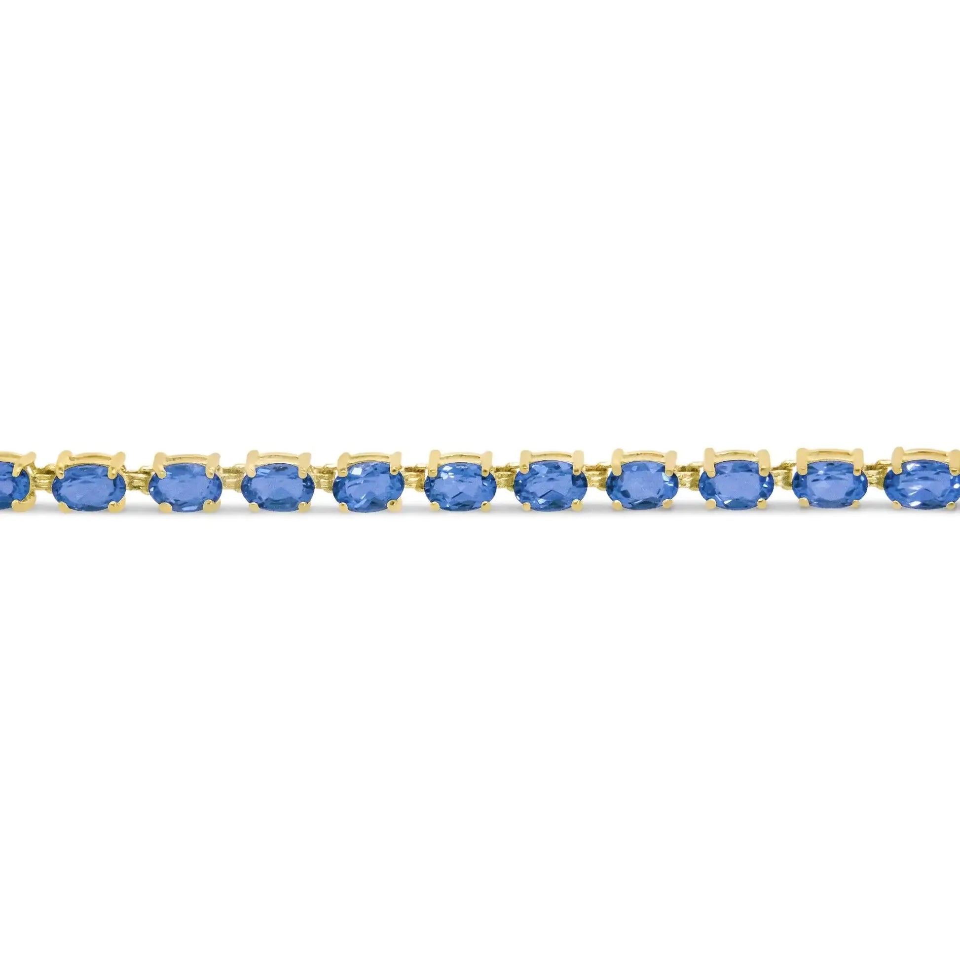 10K Yellow Gold Oval Blue Topaz Tennis Bracelet - 7 Inch - Solstik