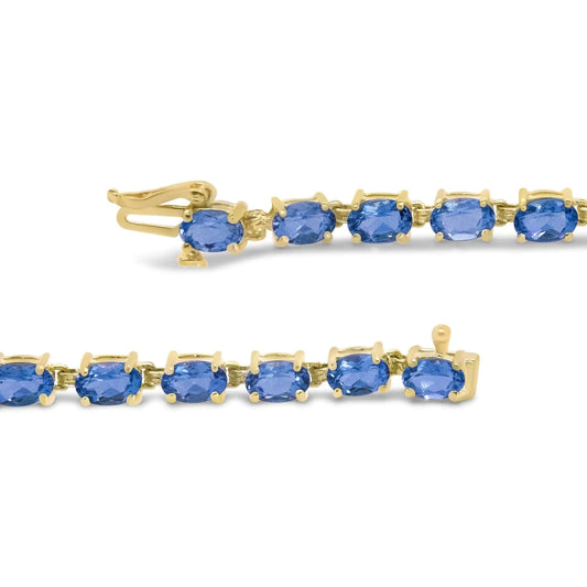 10K Yellow Gold Oval Blue Topaz Tennis Bracelet - 7 Inch - Solstik