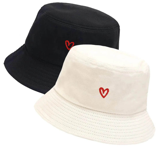Solstik designer beach bucket hats in black and white with red heart embroidery
