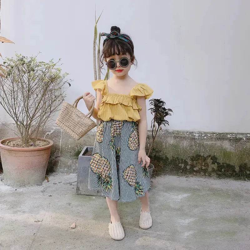 Cute girls pineapple skirt and top set with yellow ruffled top and striped skirt with pineapple print