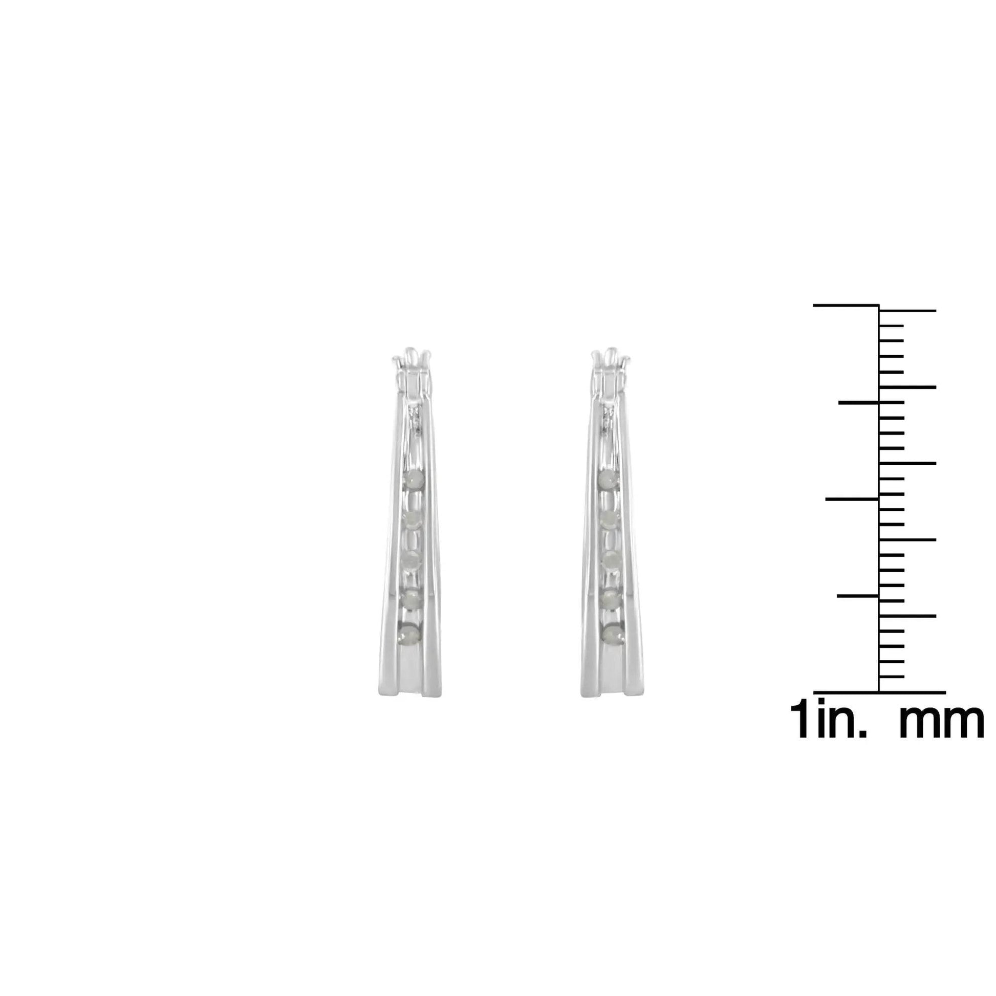 Solstik diamond accent silver hoops tapered slim hoop earrings with small channel set diamonds and inch scale