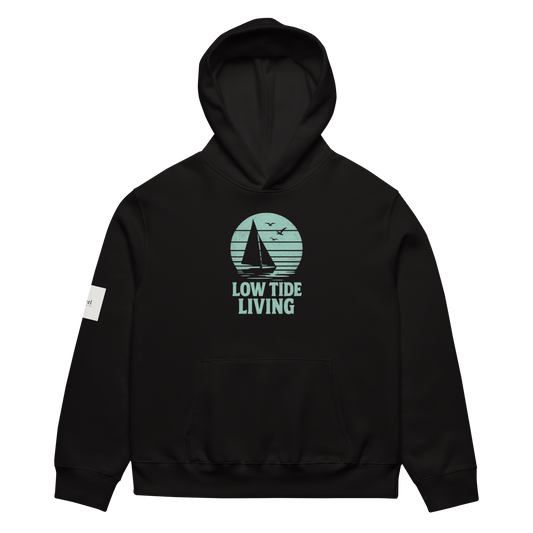 Solstik black premium heavyweight pullover hoodie with teal sailboat Low Tide Living graphic kangaroo pocket