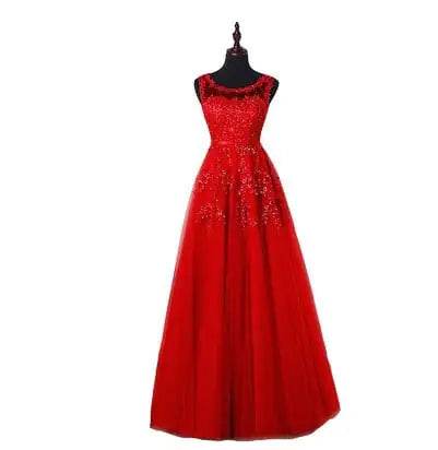 Solstik luxury bridesmaid gown for summer in vibrant red with intricate beadwork and flowing skirt