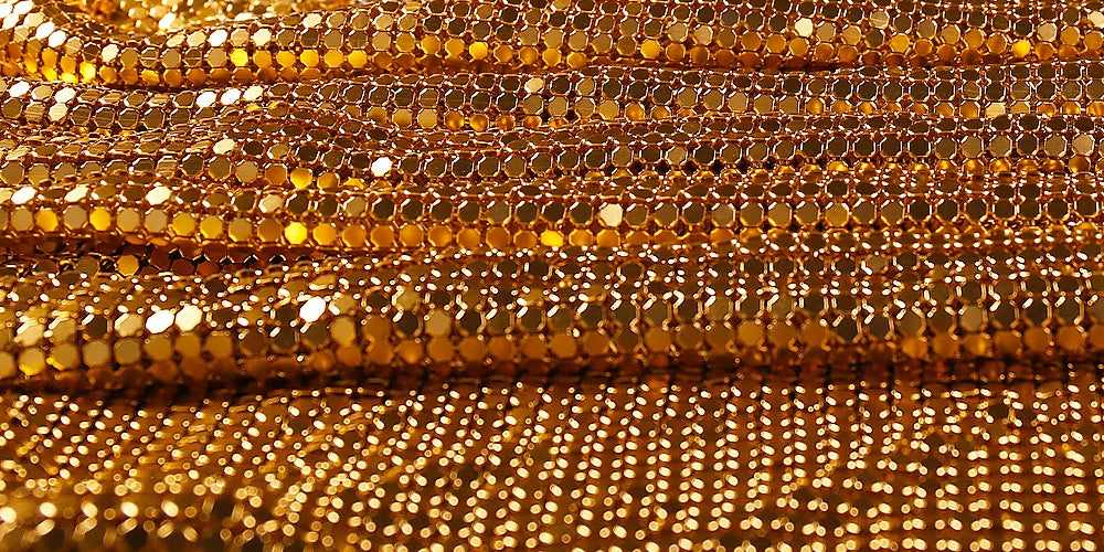 Evelyn Belluci luxury chainmaille cocktail dress with shimmering gold metal discs for elegant evening wear