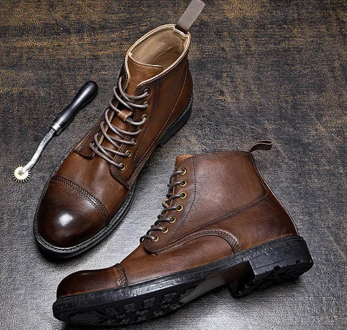 Solstik men's black leather formal boots with lace-up design and durable sole on textured surface