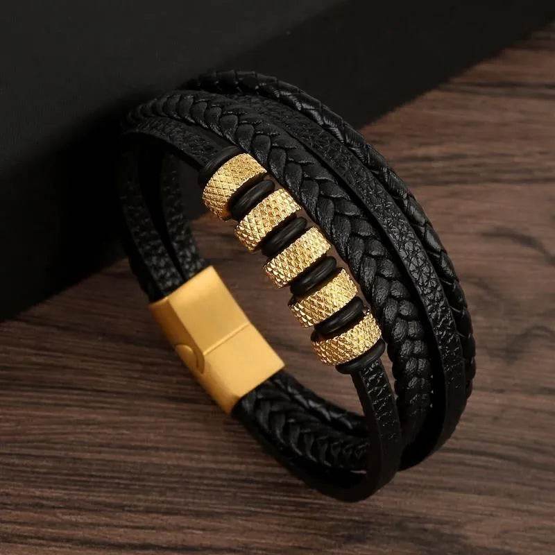 Solstik men's braided leather wristband in black with gold accent beads and magnetic clasp