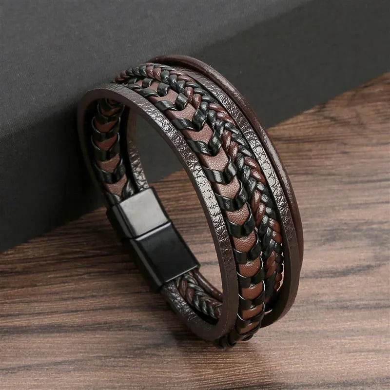 Solstik men's braided leather wristband featuring brown and black leather with magnetic clasp