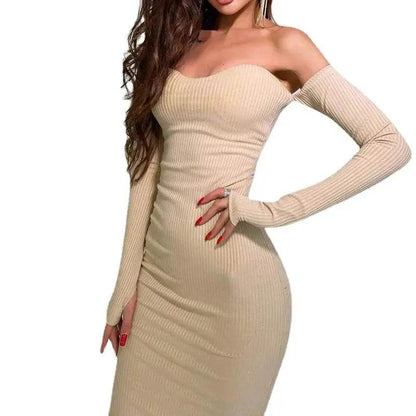 Solstik modern formal black dress for women displayed on model with off-shoulder long sleeves