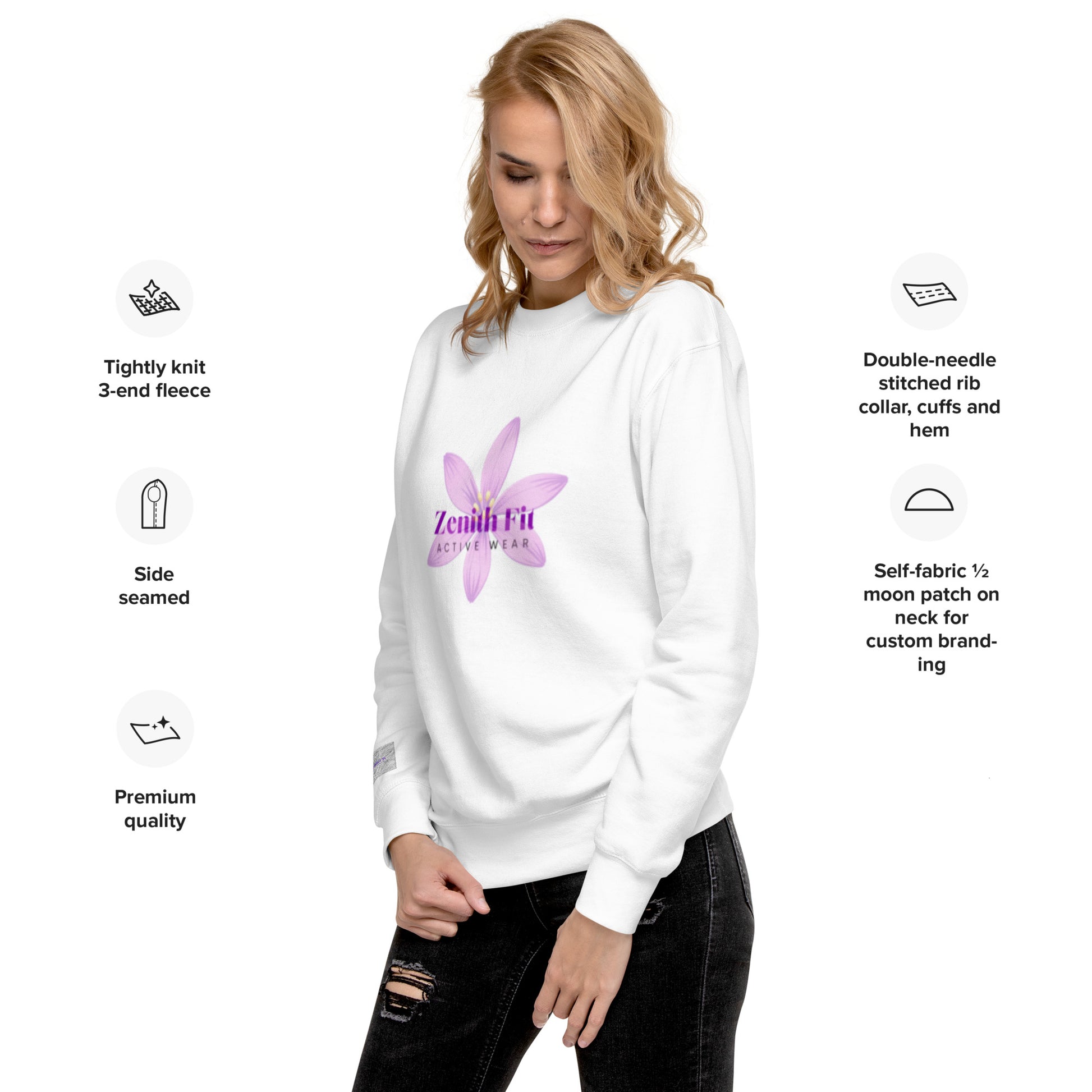 Solstik exclusive fleece crewneck white on female model with purple floral logo and ribbed cuffs