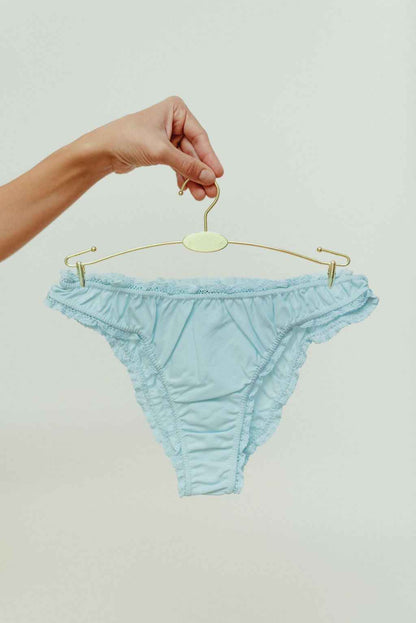 The pastel blue frilly panties