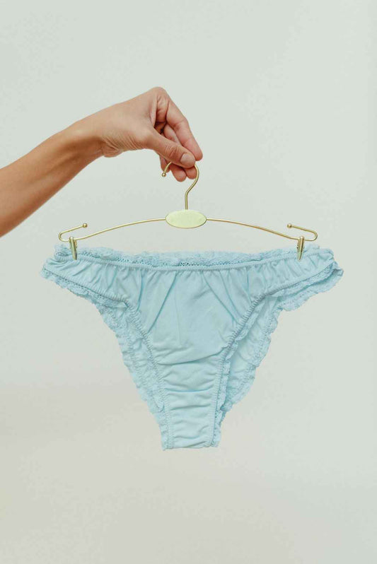 The pastel blue frilly panties
